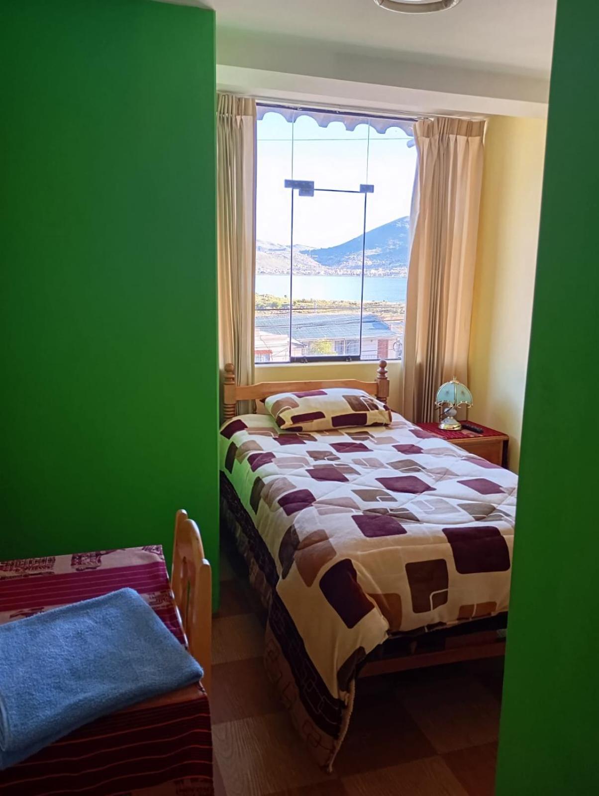 Hostal Vista Al Lago Titicaca Puno Exterior photo