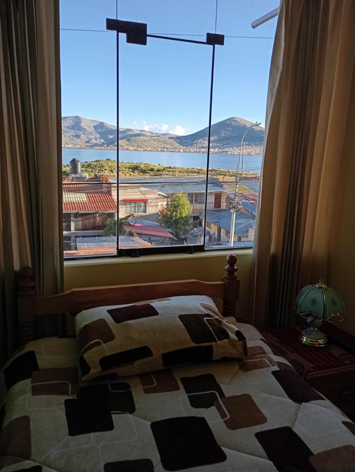 Hostal Vista Al Lago Titicaca Puno Exterior photo